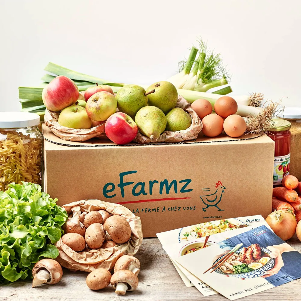 An eFarmz box — organic produce, eggs, and recipe cards